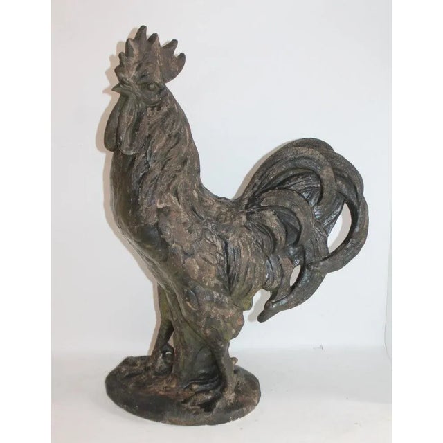 This folky rooster is made of plaster or ceramic and great for a farm porch or yard. It is a heavy distress painted rooster.
