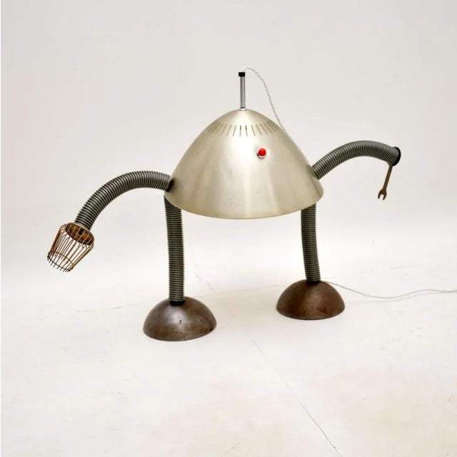 A unique and very unusual vintage robot table lamp. This was hand made by a crafty individual in around the 1960-70’s....