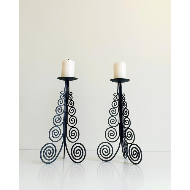 Striking pair of large hand-forged spanish colonial iron candelabra, circa 1970s a magnificent pair of large hand-forged...