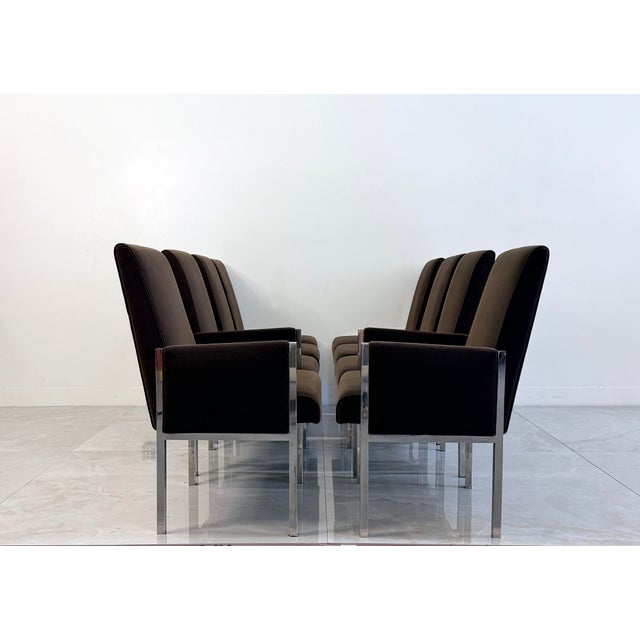 Eight chairs, one flawless vibe. This set includes six side chairs and two captain's chairs, all built on Leon Rosen's...