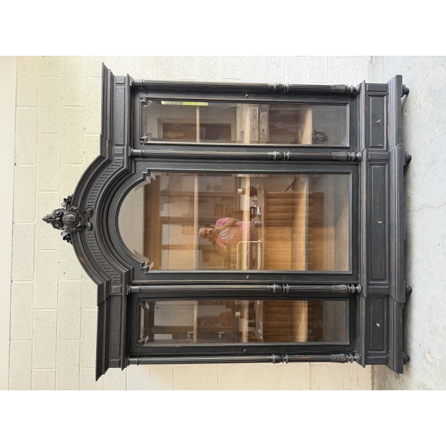 This majestic Napoleon III-era bookcase has been fully restored. It features three large glass doors that open onto...
