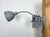 This vintage industrial adjustable gooseneck grey scissor wall light was produced by Elektroinstala Dečín in former...