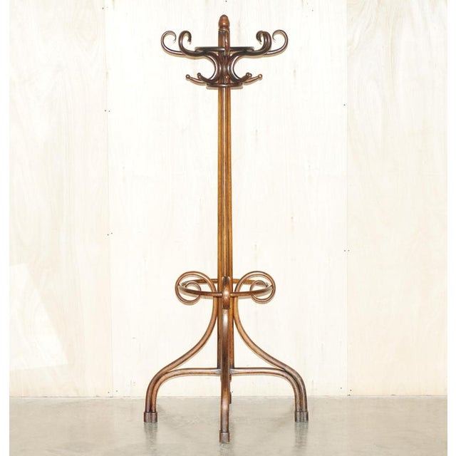 This Antique original, circa 1880, extra large, Thonet Bentwood solid Beech wood eight prong coat stand / rack. This is in...