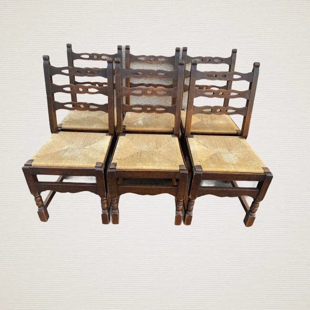 Dining room chairs from the 50s, set of 6, in solid oak, straw seat redone to new.all seats can be dismantled for...