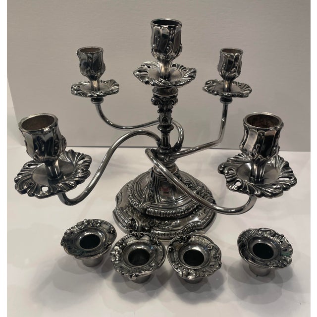 Reed and Barton silver plate 5 light candelabrum, the four arms with removable bobeches. Marked on the base. Combined...