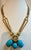 Modern 60 Ct Natural Sleeping Beauty Turquoise Necklace, Three Charm 18 Kt Gold For Sale - Image 3 of 8