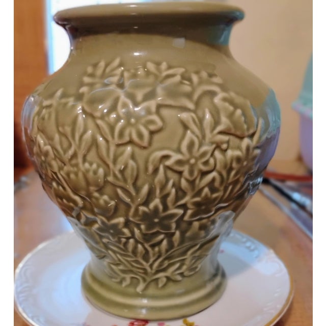 This gorgeous vase is a retired pattern from Longaberger pottery in sage green.