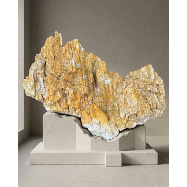 A substantial natural Himalayan Golden Feldspar matrix specimen selected for its stratified architectural form, warm...