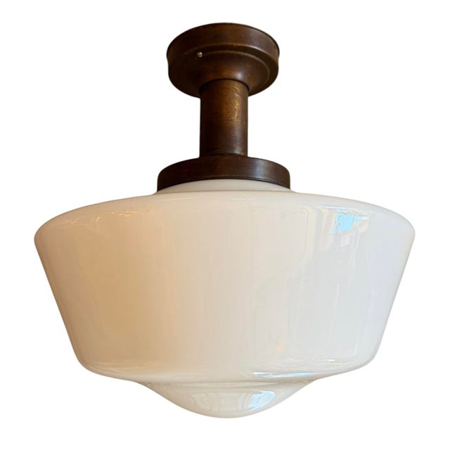 A stunning pair of very large ceiling lights from the 1920’s.
