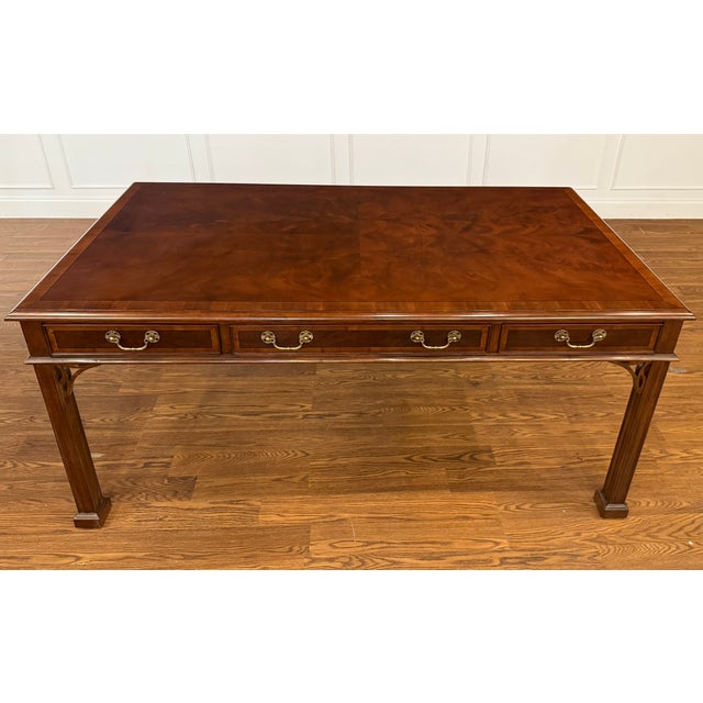This is a classic Chippendale Writing Desk by Leighton Hall. This desk has multiple uses. It is ideal for the home library...