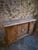 Louis XVI style cabinet dating from the late 19th century, constructed from oak and mahogany with burr elm veneer. The...