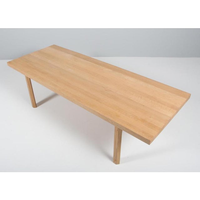 Illum Wikkelsø coffee table in solid soap treated oak. Made by Mikael Laursen, Aarhus. This piece is attributed to the...