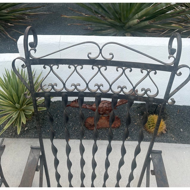 Pair of Southwestern Spanish Revival large hand wrought iron throne like chairs with twisted back spindles and scrolled...