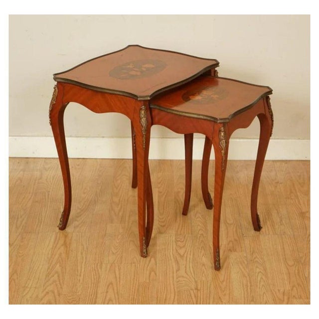 Lovely vintage french parquetry nest of tables. A lovely and elegant french louis xv style parquetry nest of tables. This...