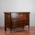 Chest of drawers inlaid on the front with a star decorated with small metal studs reallized with various woods italy end...