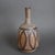 French ceramic flower vase by Alexandre Kostanda, Vallauris, France (circa 1960s). In his trademark natural clay and...