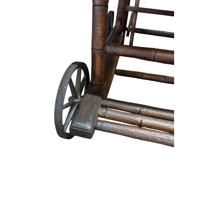 A charming antique convertible rocking chair that transforms into a child’s high chair, showcasing ingenious 19th-century...
