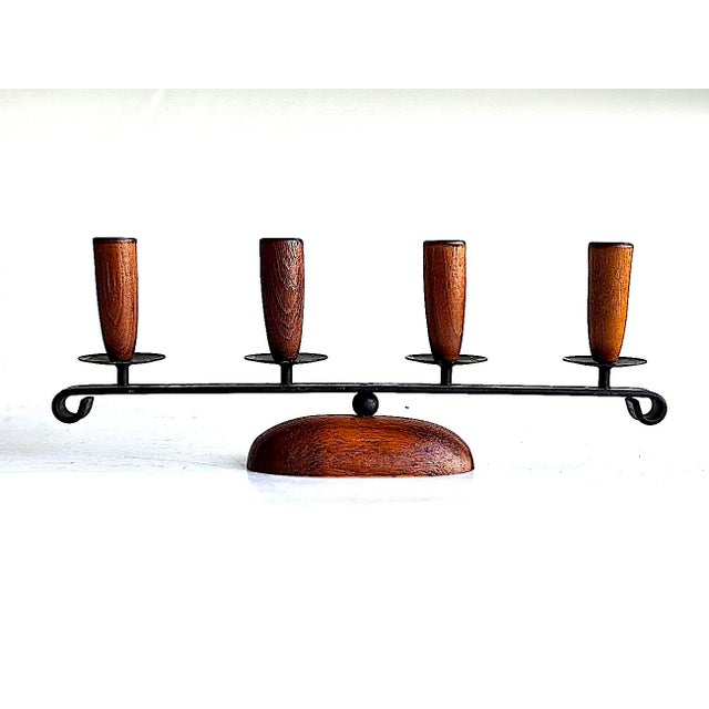 Offered is a quintessential Danish teak wood string candelabra made in the 1960s by Lüthje, designed by Kai Polk. It...