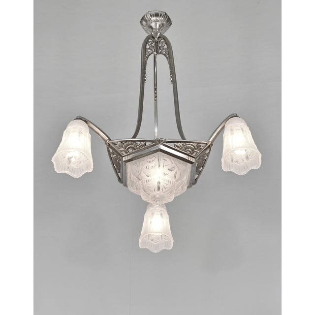 MAYNADIER A rare French 1930 art deco chandelier in nickel plated solid brass or bronze by Maynadier. Pierre Maynadier had...