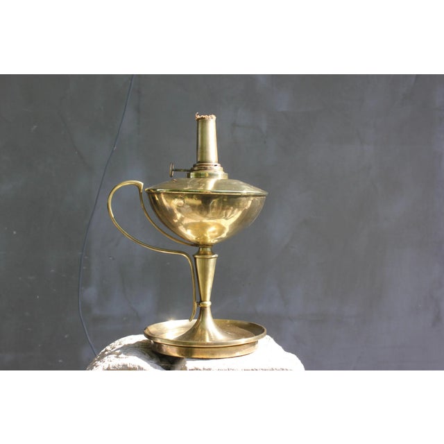Large elegant brass desk oil lamp from France. Height: 12 inches (30 cm) Diameter of the bottom: 7 inches (17 cm) This...