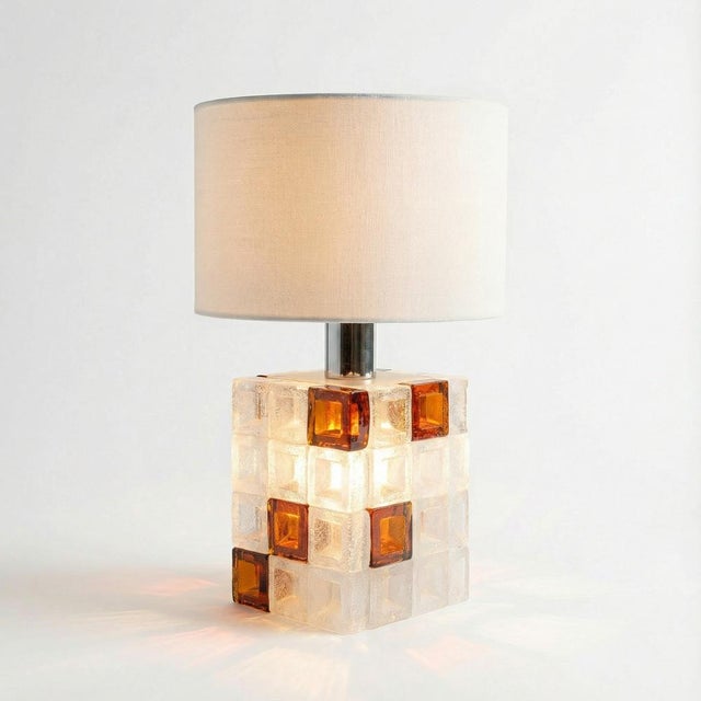 Table lamp designed by Albano Poli for Poliarte, Italy, produced in the 1960s. The geometric structure is composed of...