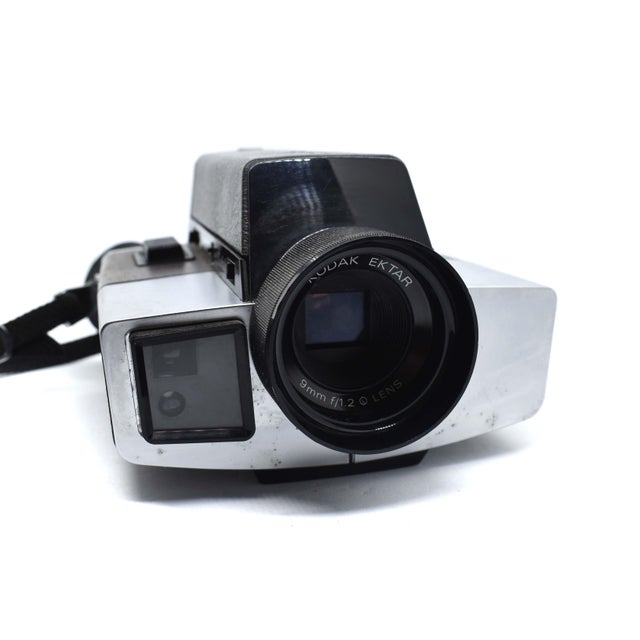 Capture the nostalgic charm of 1970s home filmmaking with this vintage Kodak XL33 Super 8 Movie Camera. A beautiful...