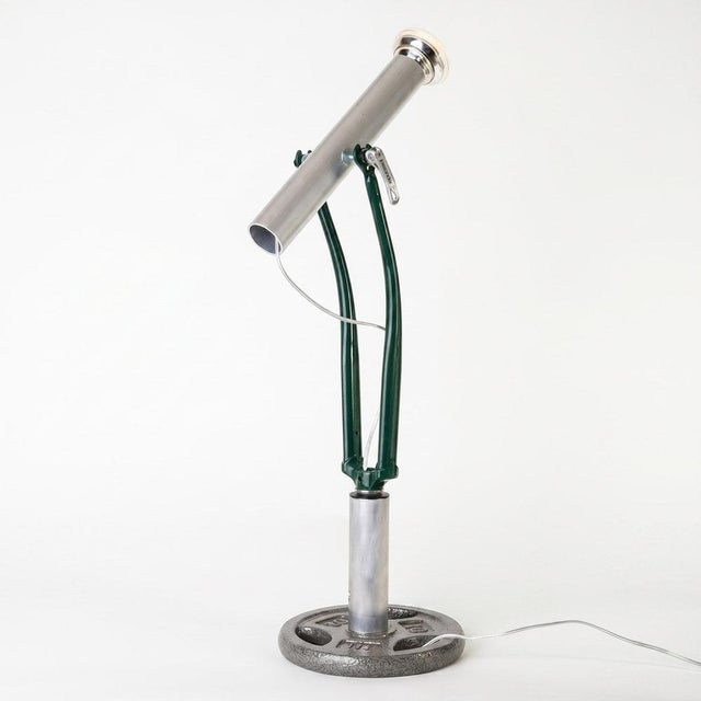 Raw aluminium head and post, brazed steel road-bike fork (powder-coated), cast-iron counterweight base. E27 spot, 8.5w...