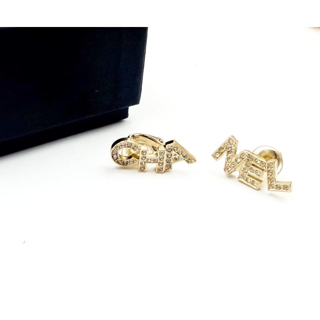 Contemporary Chanel Gold CC Crystal Cha Nel Letter Asymmetrical Clip on Earrings, A Pair For Sale - Image 3 of 4
