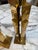 Striking pair of sculptural brass table lamps featuring bold geometric forms and an architectural modernist silhouette....