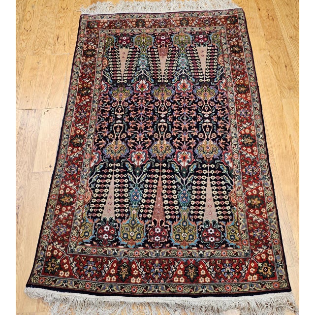 "This exceptional antique Tabriz rug from the early 20th century features an exquisite allover design that reflects the...