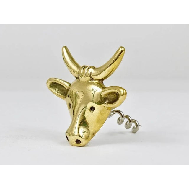 A charming Mid-Century bottle opener/cork screw, displaying a cow. A very humorous design by Walter Bosse, executed by...