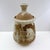 Beautiful vintage handmade studio pottery lidded vessel featuring a warm earthy brown clay body with an expressive cream...