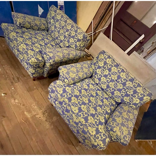 These chairs have an amazing mid century low squat design and floral pattern upholstery with a light purple/blue...