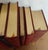 Easton Press Leather Bound Books Set of 10. Mostly red. A Good Life is signed, 6 have collectors plates. The red and the...