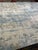 This hand-knotted rug from Nepal is a refined study in texture, material, and understated design. Measuring 10' x 14', it...