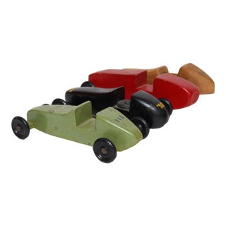 Set of Four Vintage Painted Pinewood Racers For Sale