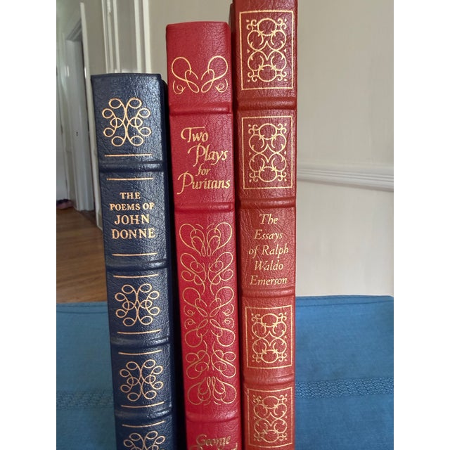Beautiful collection of leather bound books from the Easton Press. This collector's edition features... The Poems of John...