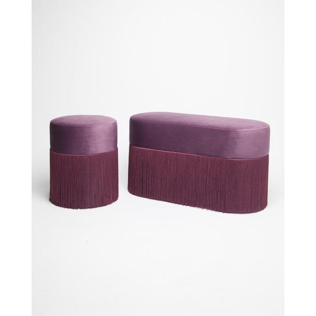 Set of 2 poufs pill l and s by houtique dimensions: h 45 x 80 x 35 cm h 45 x 35 x 35 cm materials: velvet upholstery and...