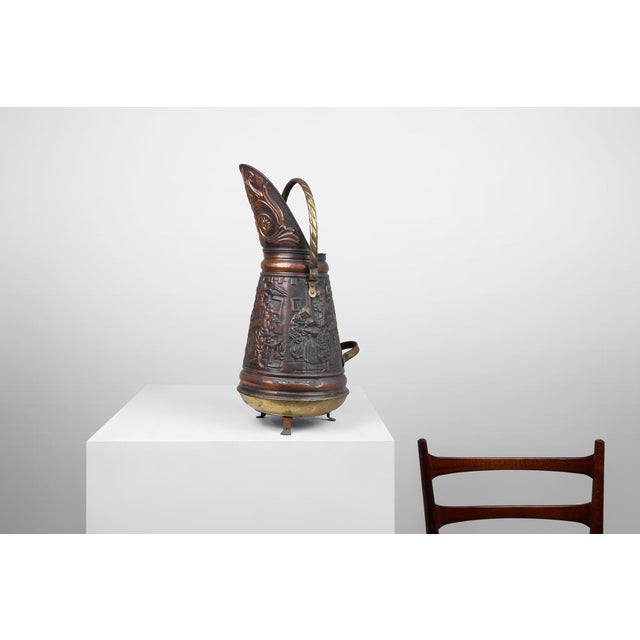 This charming antique copper coal scuttle was crafted in France around 1900 and today lends itself beautifully as a...