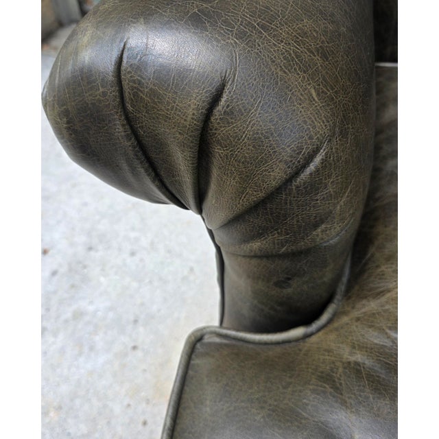 Vintage English Georgian Style Distressed Olive Green Leather Wingback Library Armchair With Ball & Claw Feet For Sale - Image 4 of 12