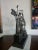 Fantastic metal sculpture features 6 figures singing and playing instruments by metal artist Thomas Hoffmaster. Signed in...