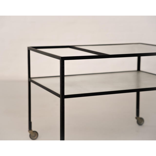 The Herbert Hirche serving trolley, designed in 1956 and produced by Holzäpfel, is a landmark of post-war German...
