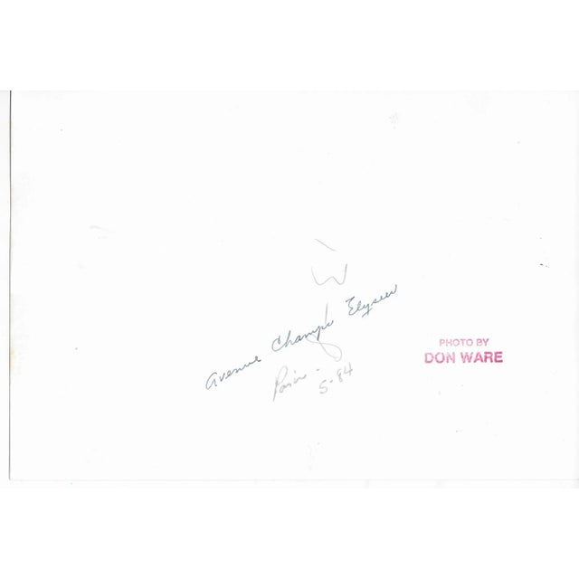 1984 black & white photograph by Los Angeles photographer Don Ware of Avenue Champs Elysees. Titled, dated and bearing...