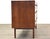 A mid century modern walnut nine drawer dresser designed by Jack Cartwright for Founders with inset pulls. Professionally...