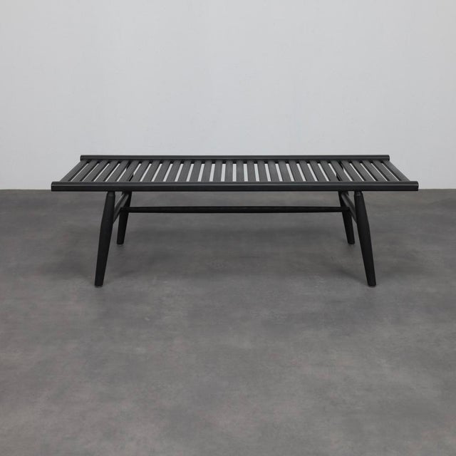 A refined contemporary slatted wood bench produced by stellar works in the 2000s. This bench embodies a calm,...