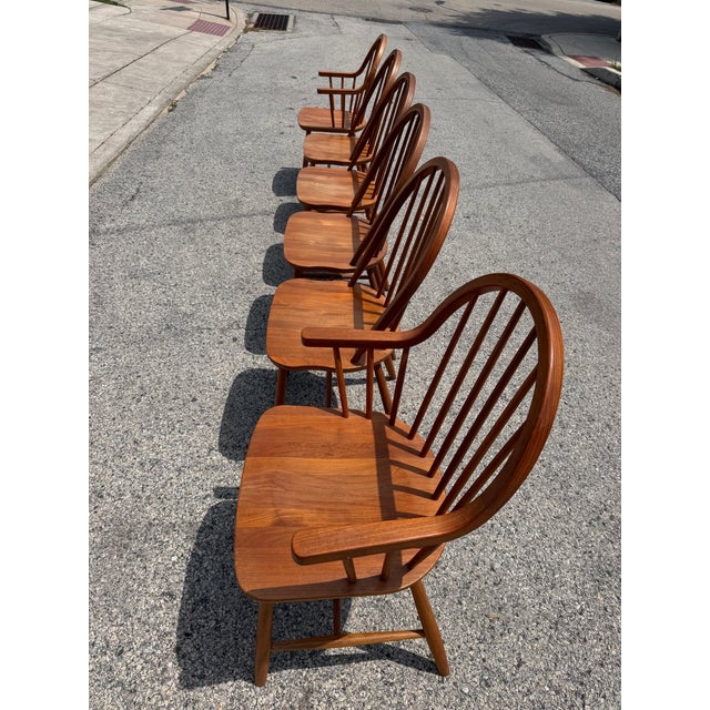 Mid century Danish dining chairs by Erik Jorgensen for Tarm Stole OG Mobelfabrik. The beautiful spindle chairs are made...