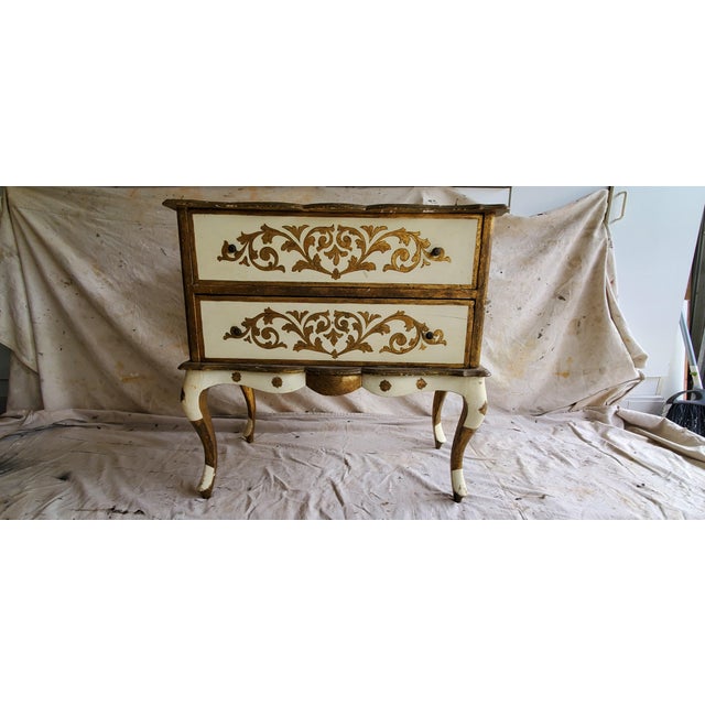 Classic Florentine! This makes a statement in any room with the curved legs, top and bottom apron. The sides have the same...