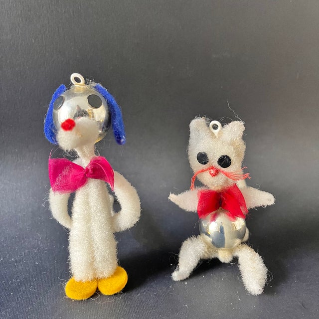 Extraordinary trio of handmade mid-century Christmas decorations inspired by cartoon characters of a cat and a dog full of...