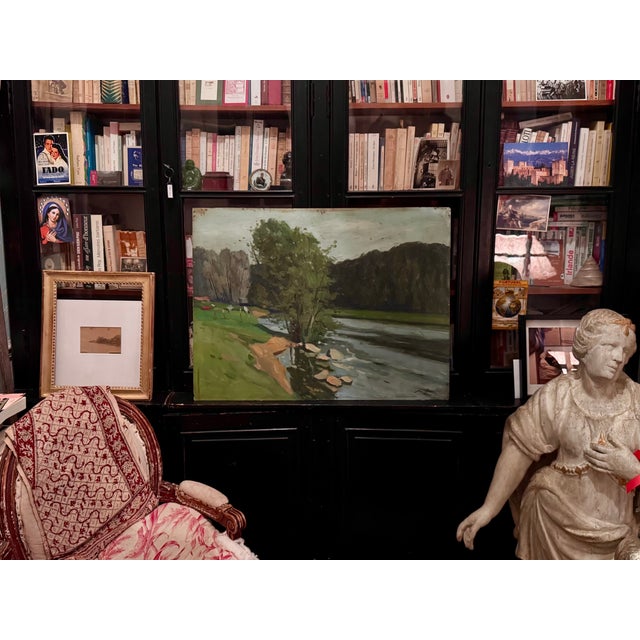 Loire Riverbank, painted circa 1930, signed lower right, signature to be deciphered. This landscape depicts a peaceful...