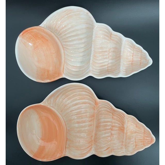 This beautiful set of two figural serving platters by Cardinal Inc. features a conch shell design, each divided into four...